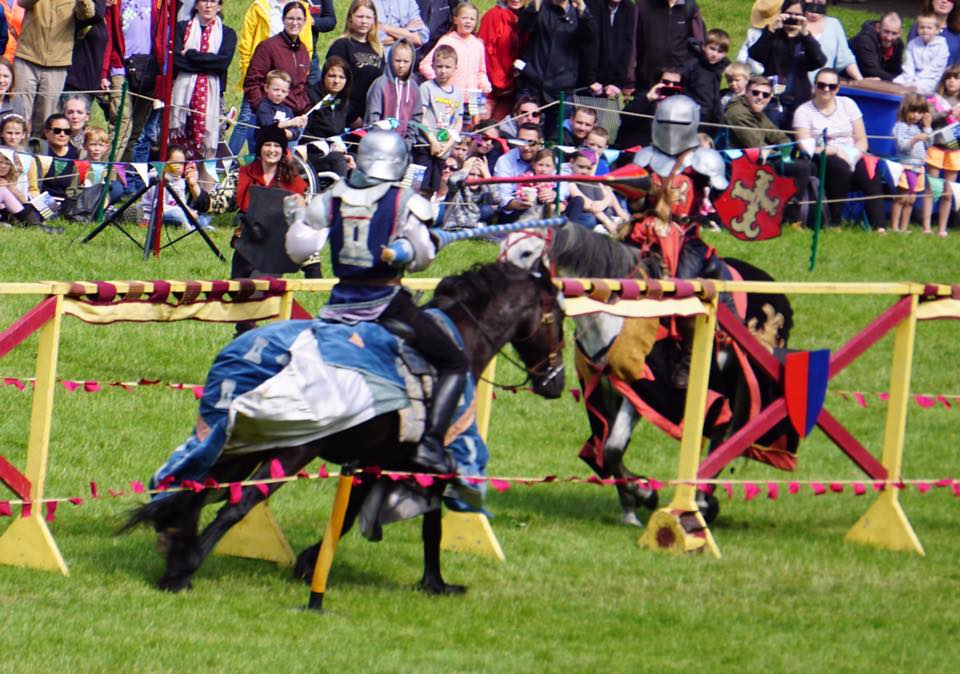 Two men jousting in modern Renaissance Fair