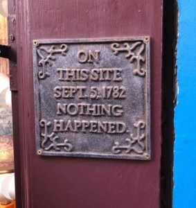 Sign on door that says "on this site in Sept 5, 1782, nothing happened."