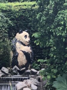 Closeup view of Panda statue in garden