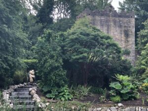 Castle garden with statue of panda in middle